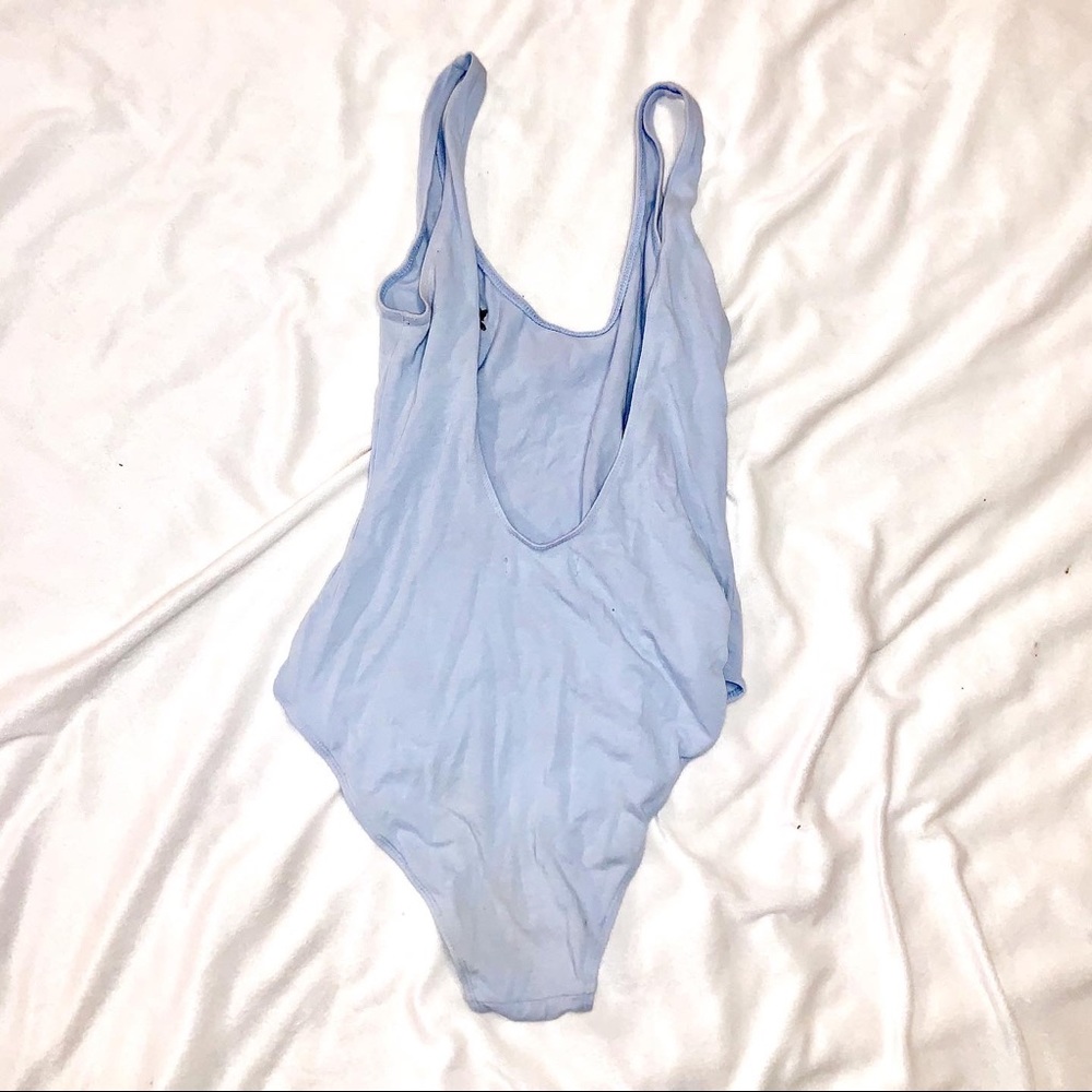 Blue bodysuit with cute little rose on it